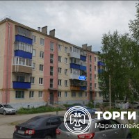 Жилое помещение (1/2 доля в праве) общей площадью 30,7 кв. м.